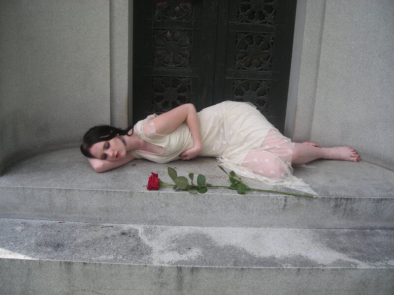 Woman in white dress on steps