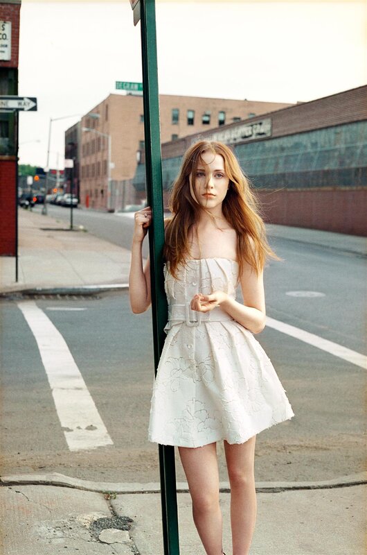 woman in white dress on street