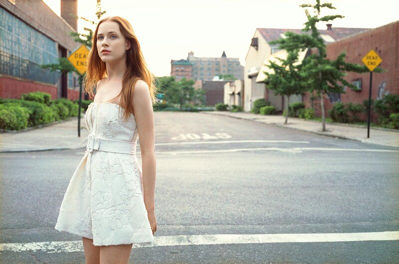 Woman in white dress on street