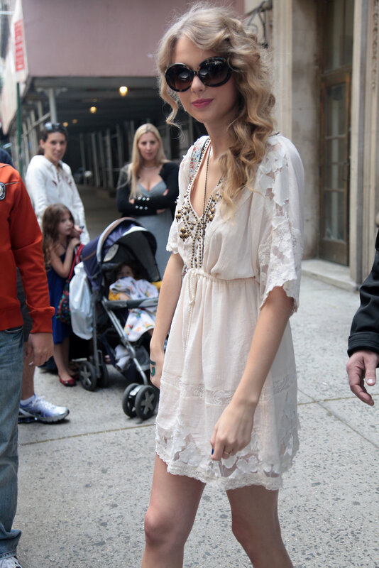 woman in white dress on street