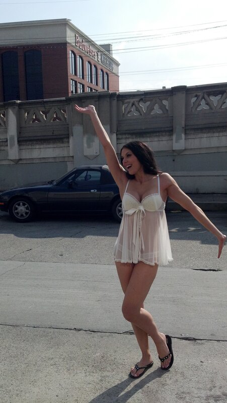 woman in white dress on street