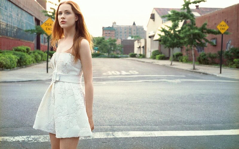 woman in white dress on street