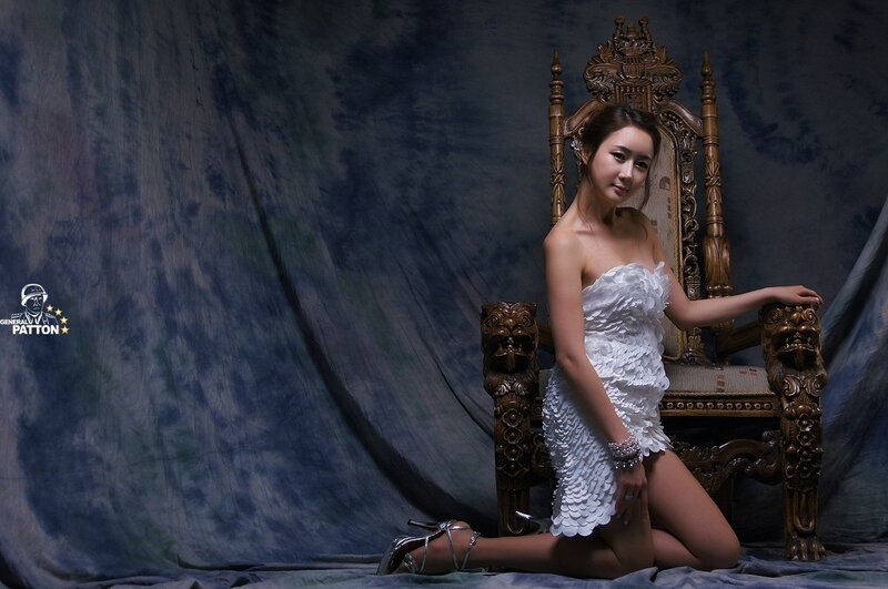 woman in white dress on throne