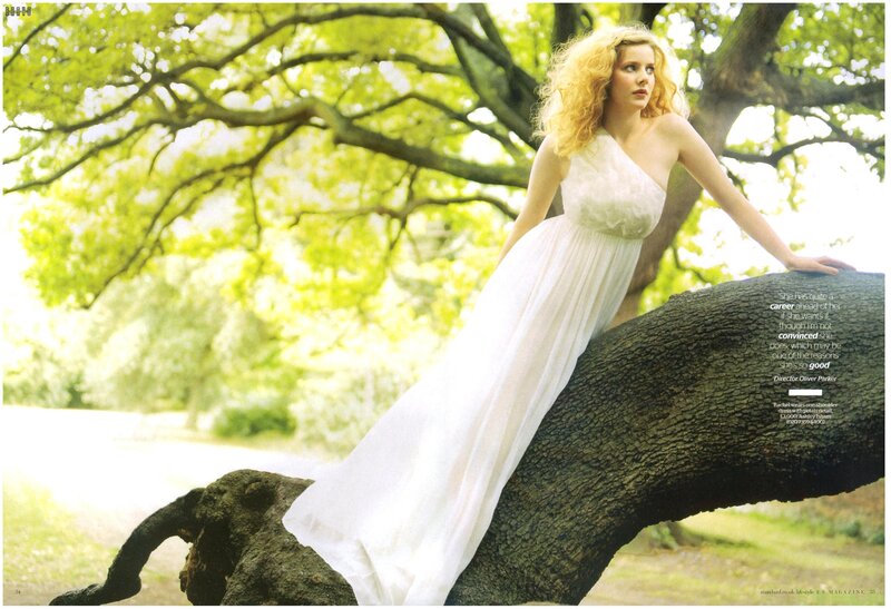 Woman in white dress on tree