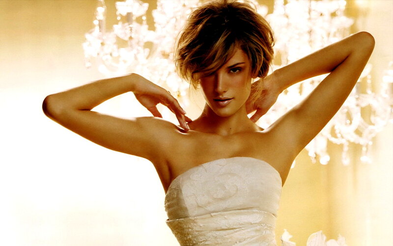 woman in white dress posing