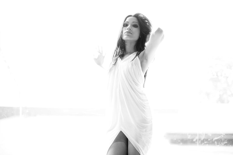 woman in white dress posing