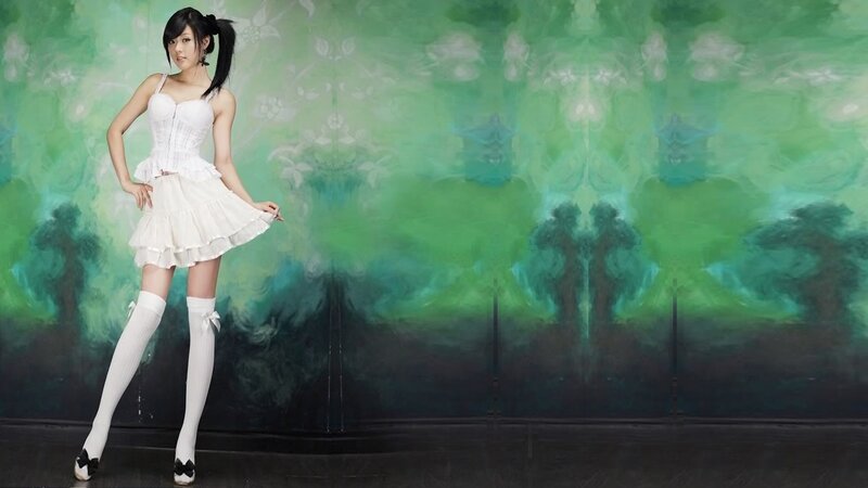 woman in white dress posing