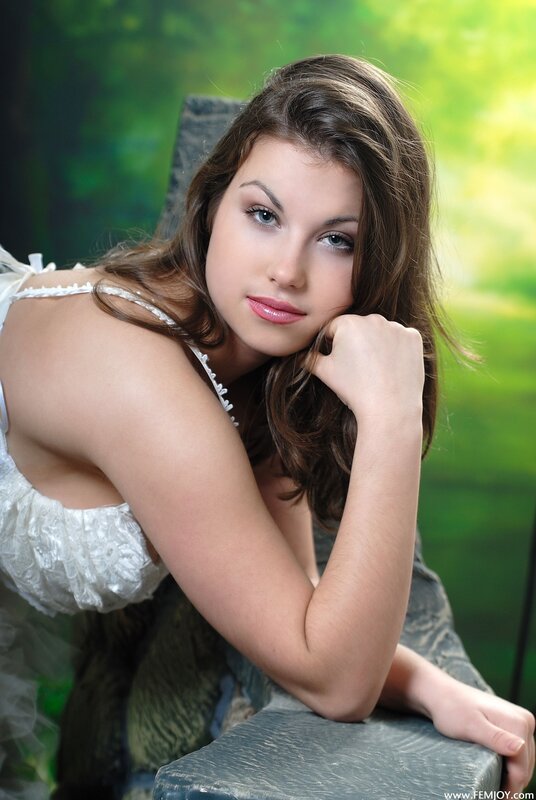 woman in white dress posing