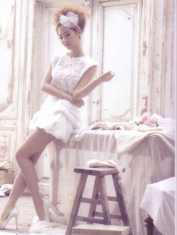 woman in white dress posing
