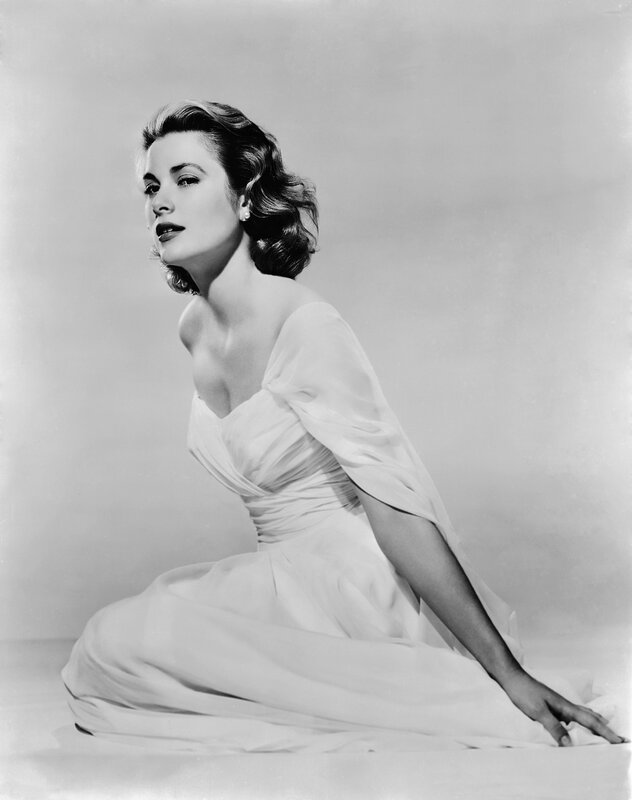 woman in white dress posing