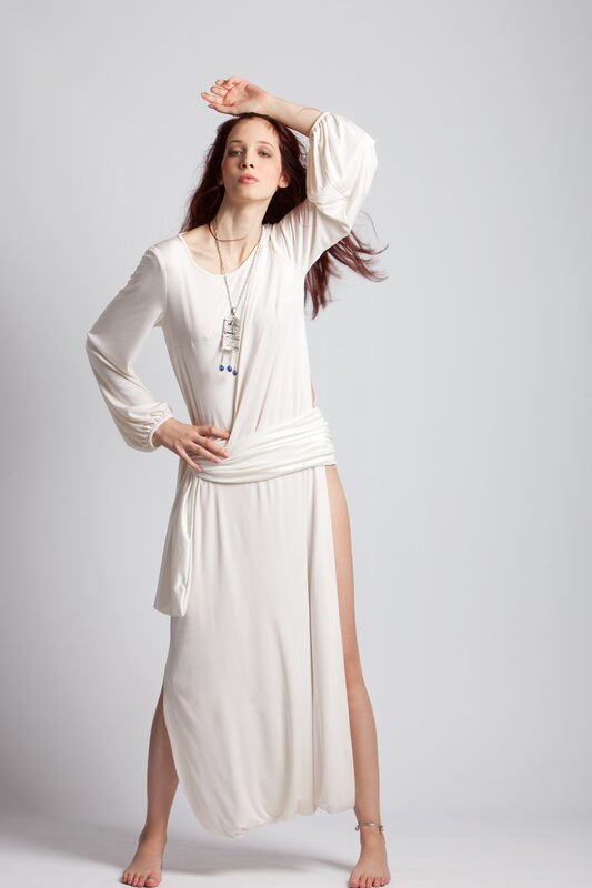 woman in white dress posing