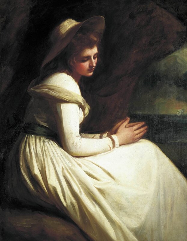 Woman in white dress praying