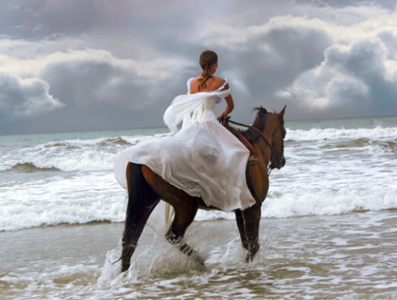 Woman in White Dress Riding Horse