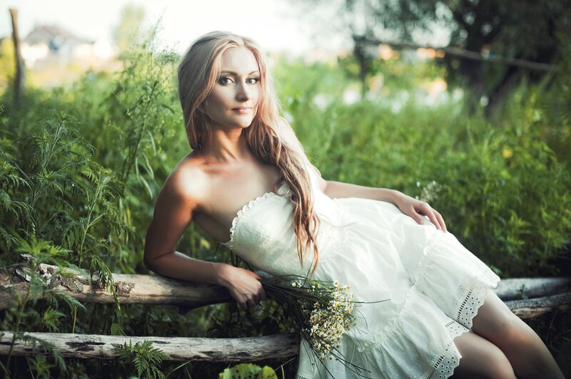 Woman in White Dress — Serene, Afternoon, Photograph, Flowers, Fence