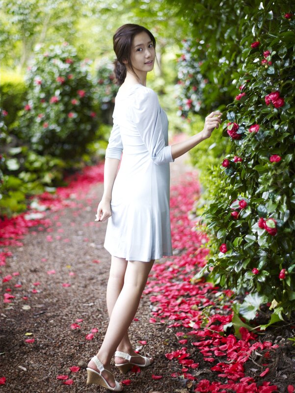 Woman in White Dress — Serene, Afternoon, Photograph, Flowers, Petals