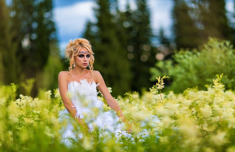 Woman in White Dress — Serene, Afternoon, Photograph, Flowers, Trees, Feather Dress
