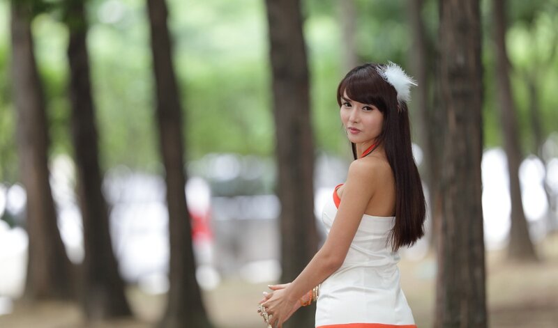 Woman in White Dress — Serene, Afternoon, Photograph, Trees, Feather
