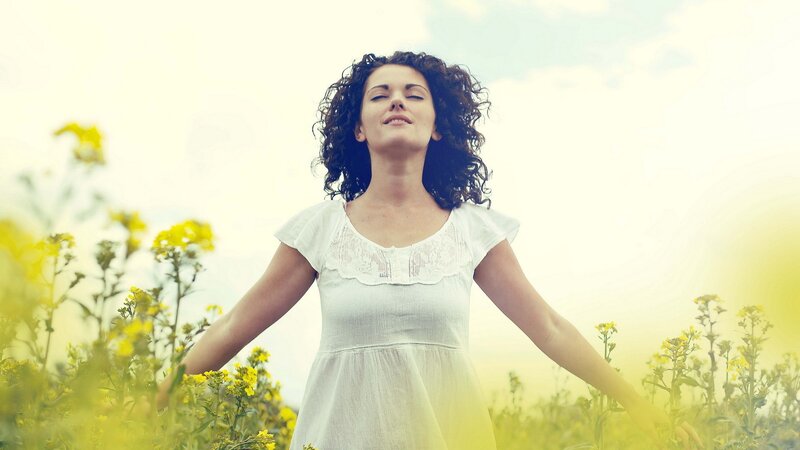 Woman in White Dress — Serene, Afternoon, Photograph, Yellow Flowers, Curly Hair