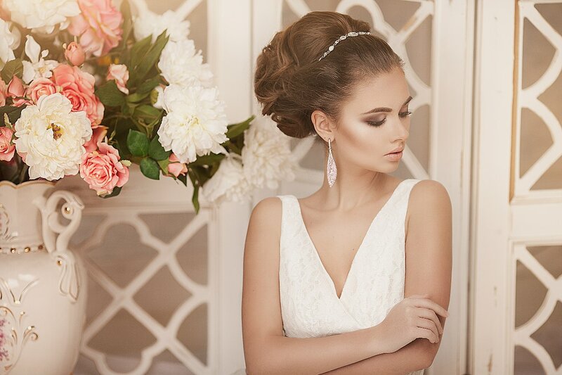 Woman in White Dress — Serene, Photograph, Flowers, Vase, Earrings
