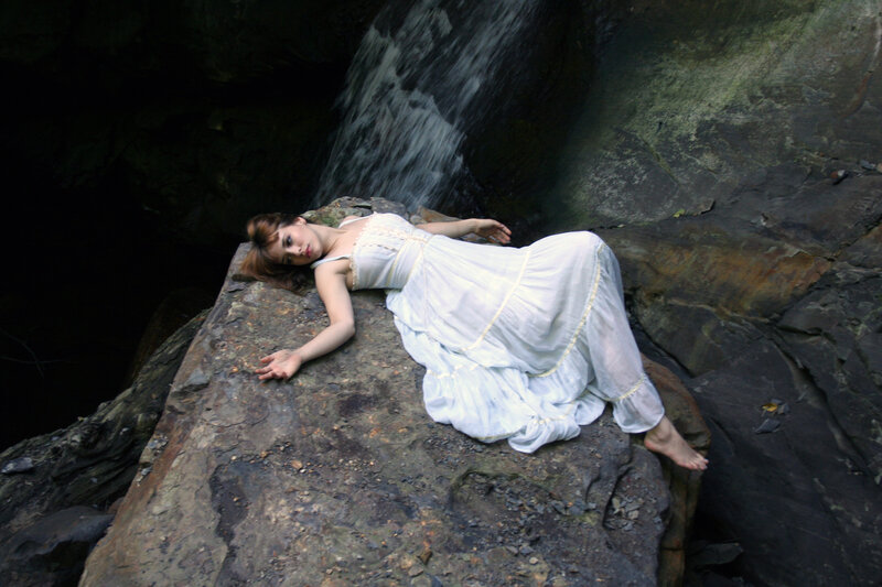 Woman in White Dress — Serene, Photograph, Rock