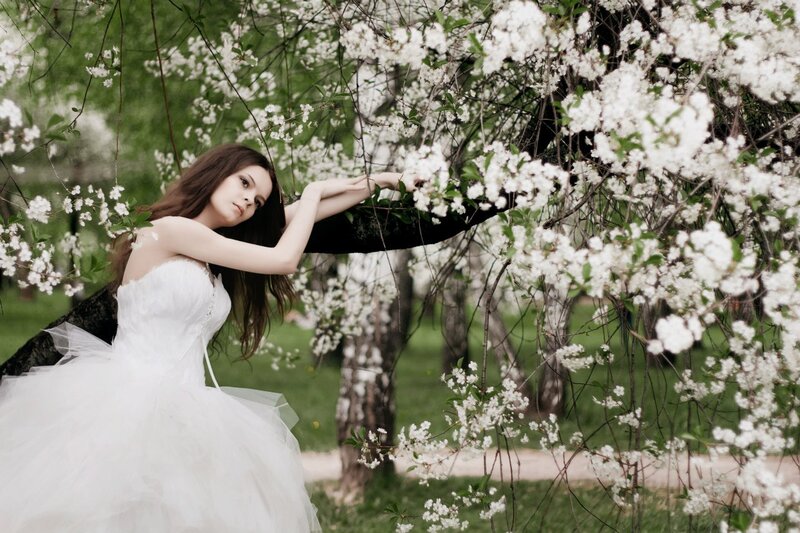 Woman in White Dress — Serene, Spring, Photograph, Flowering Tree, Green Grass, Branches