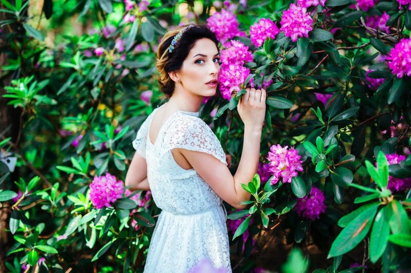 Woman in White Dress — Serene, Spring, Photograph, Flowers, Bushes, Headband