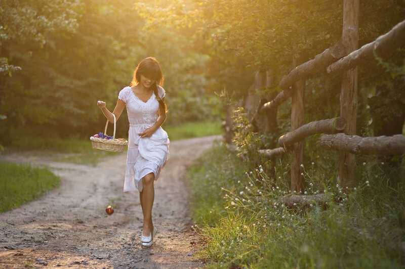Woman in White Dress — Serene, Sunset, Photograph
