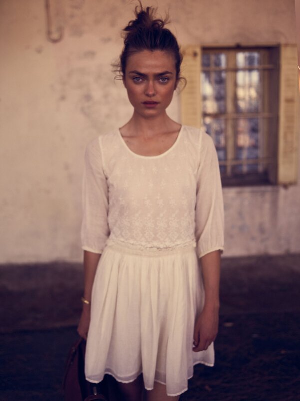 Woman in White Dress — Serious, Photograph, Window, Wall