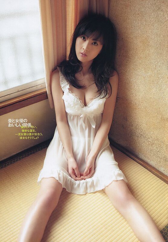 woman in white dress sitting on floor