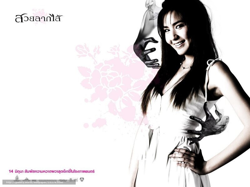woman in white dress smiling