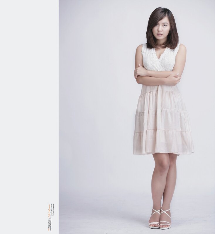 woman in white dress standing