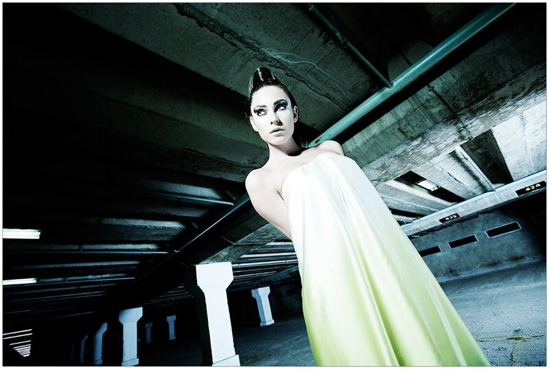 woman in white dress under bridge