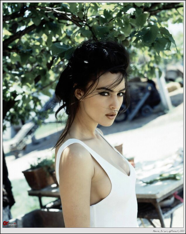 Woman in white dress under tree