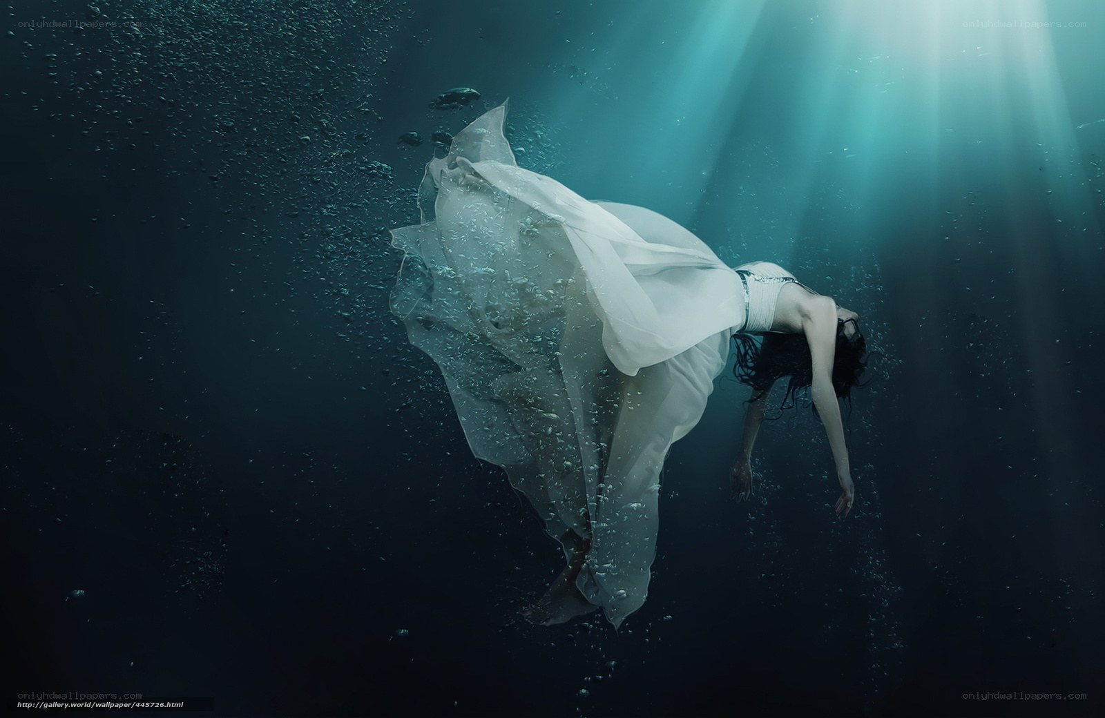 woman in white dress underwater