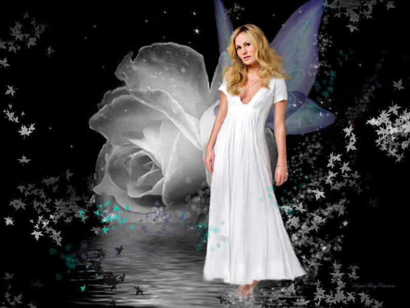 woman in white dress with fairy wings
