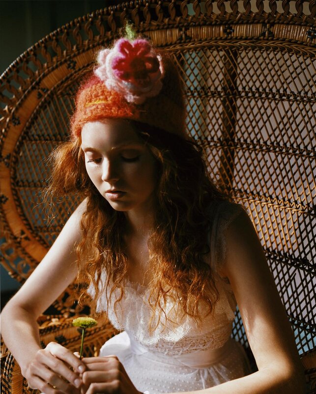 woman in white dress with flower