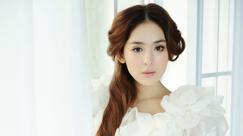 woman in white dress with flower
