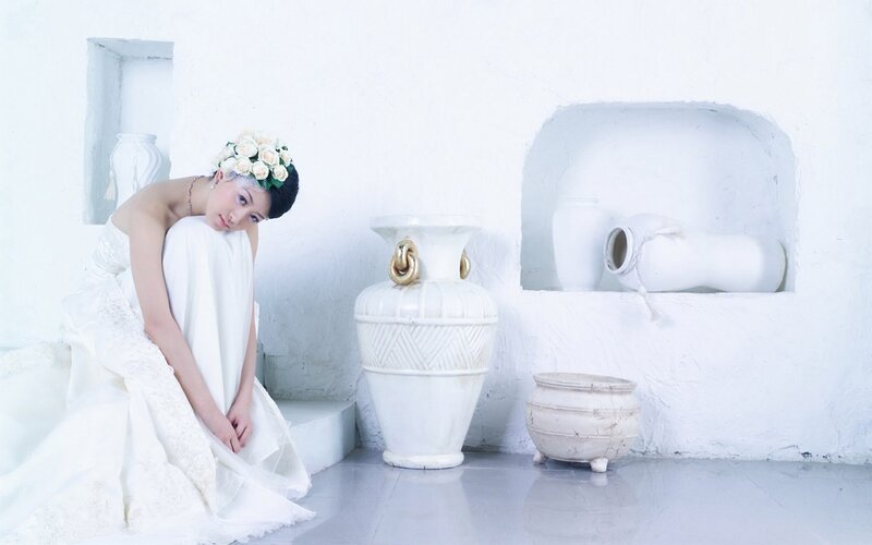 woman in white dress with flowers
