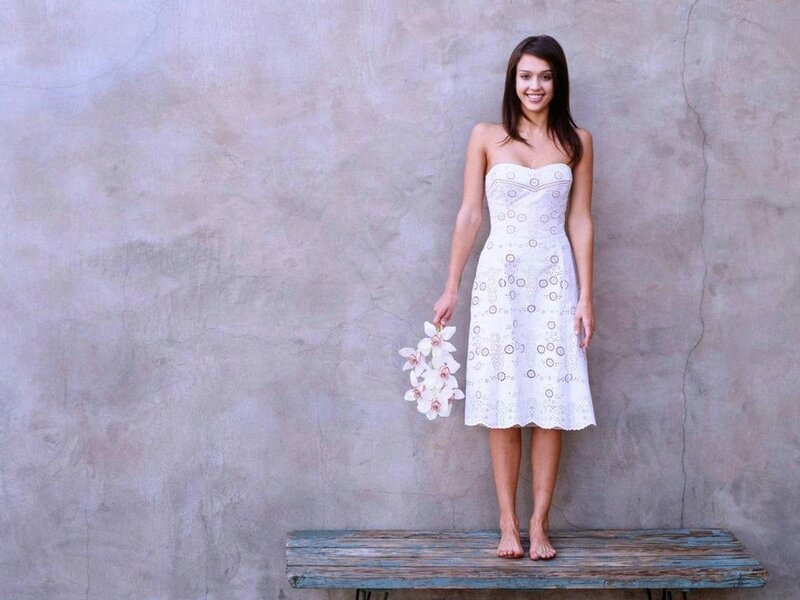 Woman in white dress with flowers