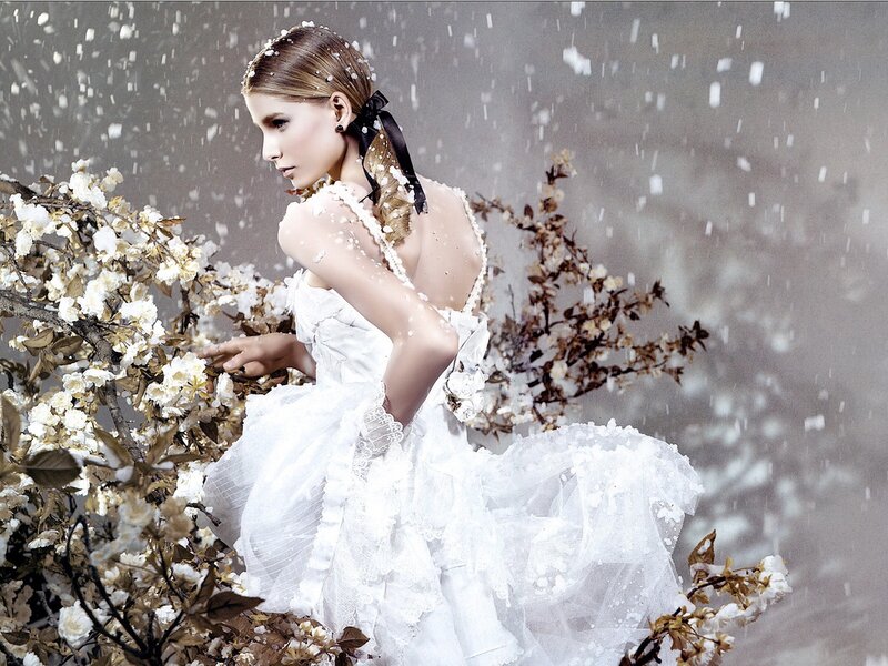 woman in white dress with flowers