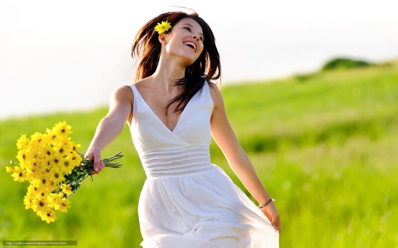 Woman in white dress with flowers