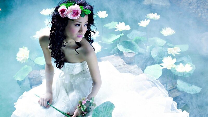 woman in white dress with flowers