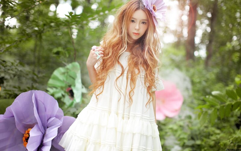 woman in white dress with flowers