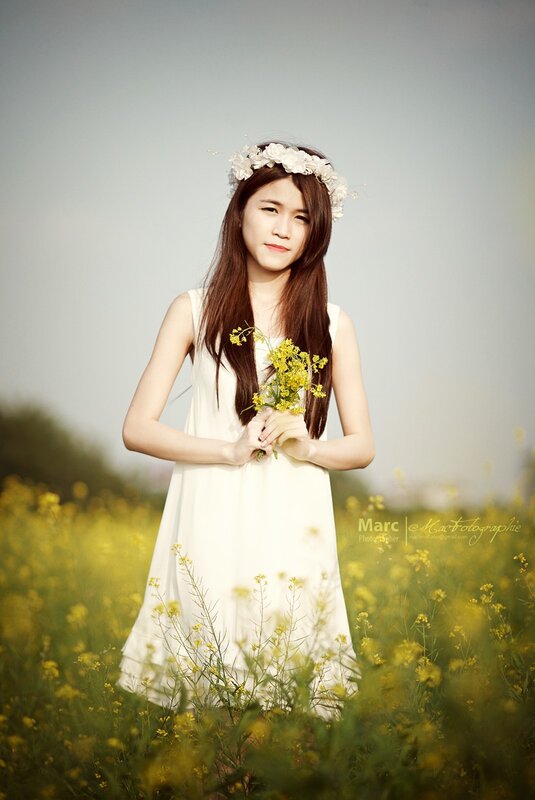 woman in white dress with flowers