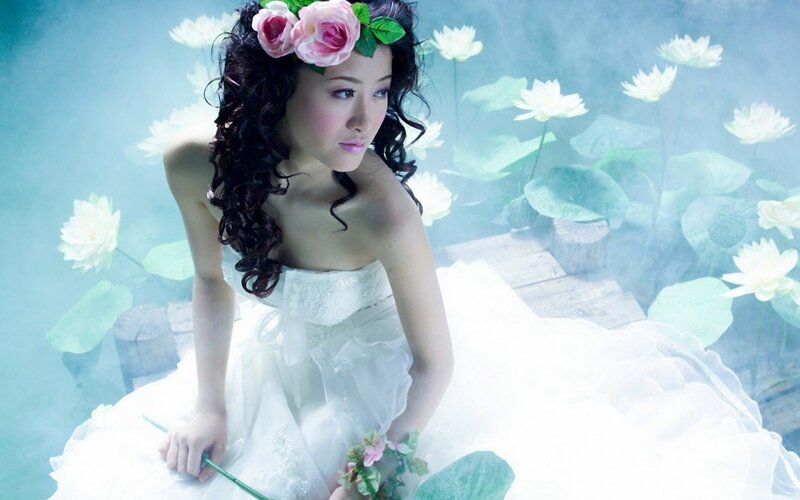 woman in white dress with flowers