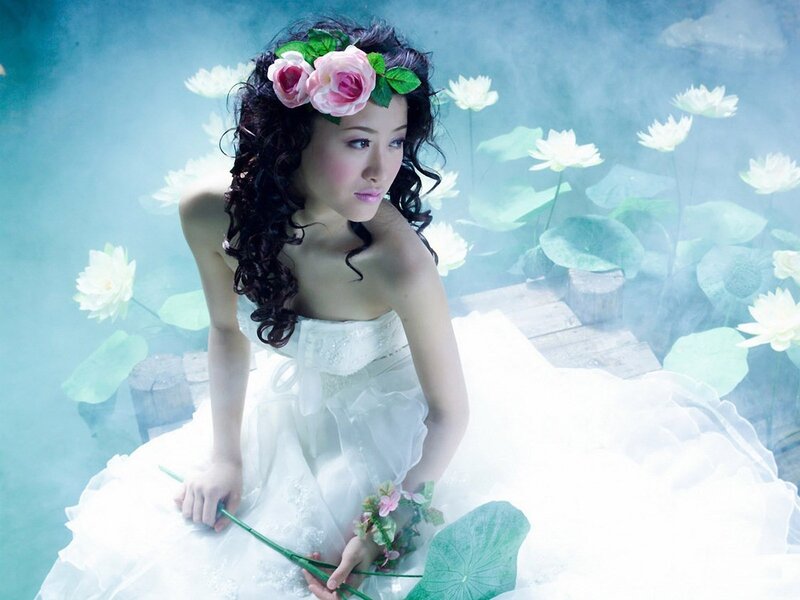 woman in white dress with flowers
