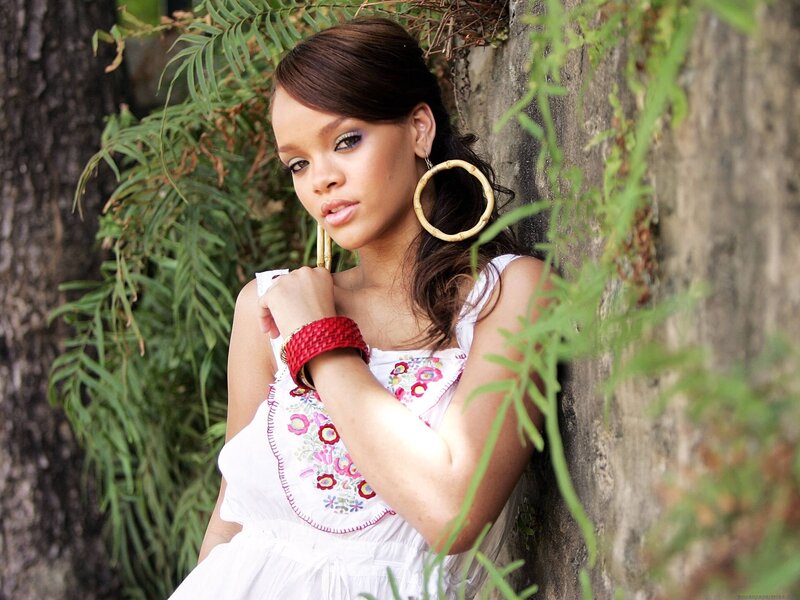 woman in white dress with hoop earrings