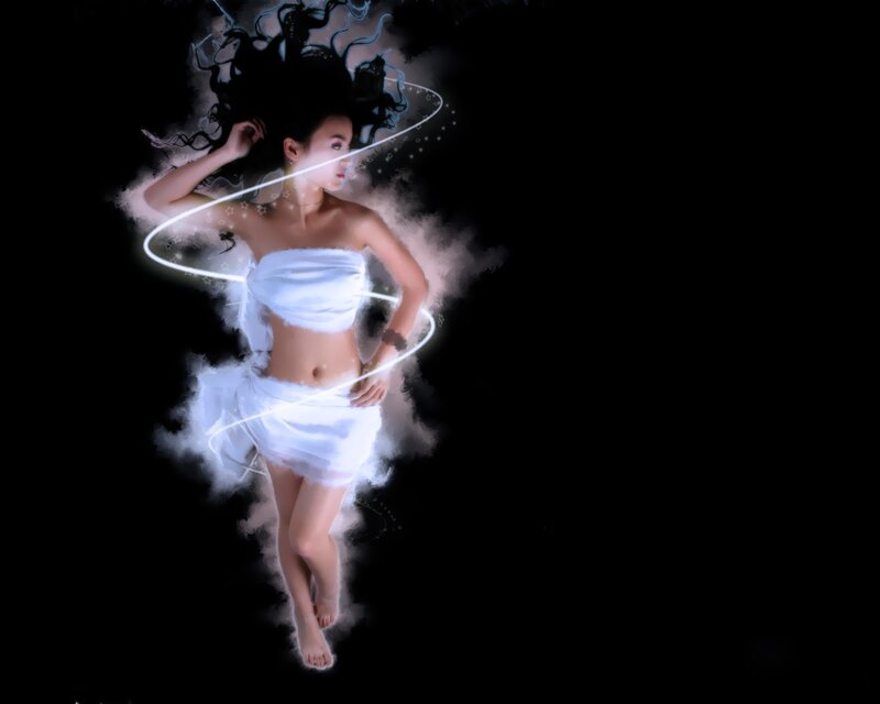 woman in white dress with light effects