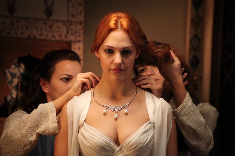 woman in white dress with necklace