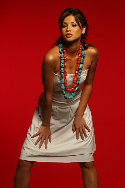 woman in white dress with necklace